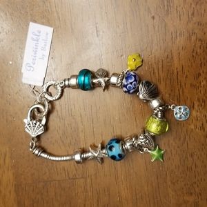 Periwinkle silver charm bracelet